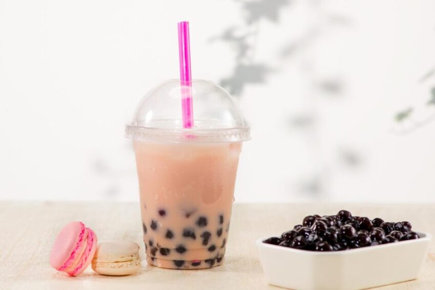 Strawberry Boba Bubble Tea with candy and ice.