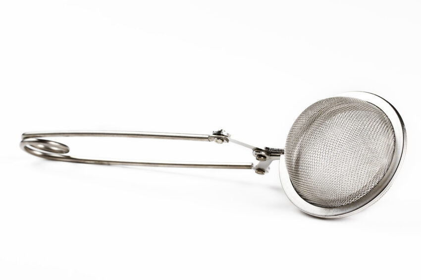 One tea and coffee infuser on white background
