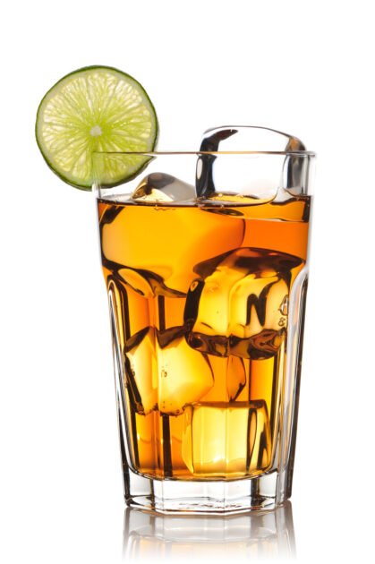 Iced tea with lime isolated on white