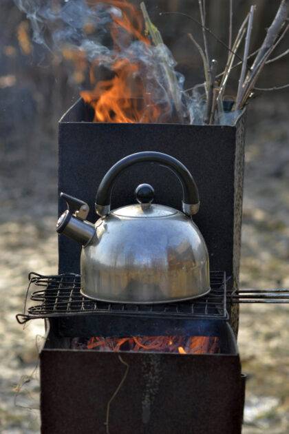 17282008_the-whistling-kettle-begins-to-boil-on-a-brazier