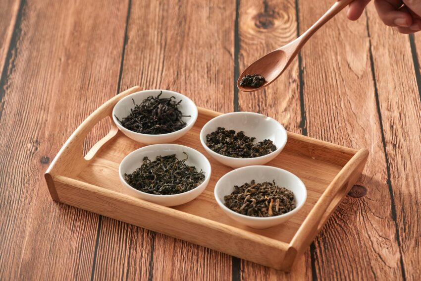 Loose Leaf Green tea on wooden spoon